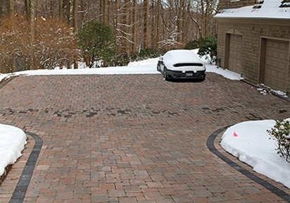 Heated paver driveway and parking area.