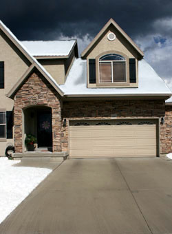 Electric heated driveway system installed in concrete driveway.