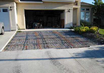 Retrofitting concrete driveway with radiant heat.