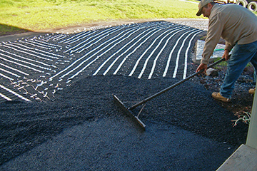 Adding radiant heat to an existing asphalt driveway.