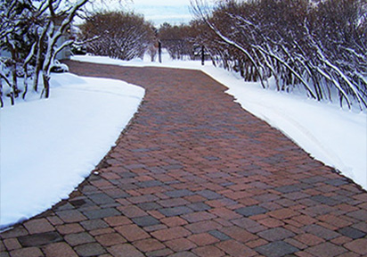 Heated driveway with brick pavers.