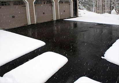 Heated asphalt driveway and walk ways.