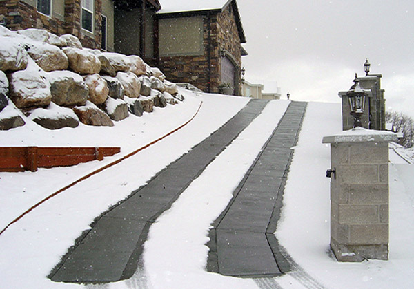 Heated driveway (heated tire tracks) during a snowstorm