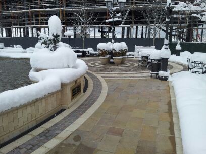 A heated walkway at an outdoor mall after a snowstorm. A heated walkway at an outdoor mall.